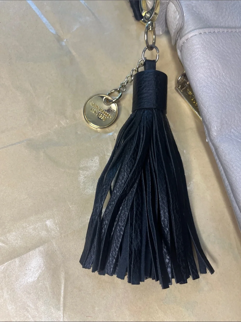 Steve Madden Cream Crossbody with Black Strap and Tassel
